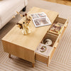 Mid-century modern rattan coffee table featuring two storage drawers and elegant wood pulp rattan for natural decor.