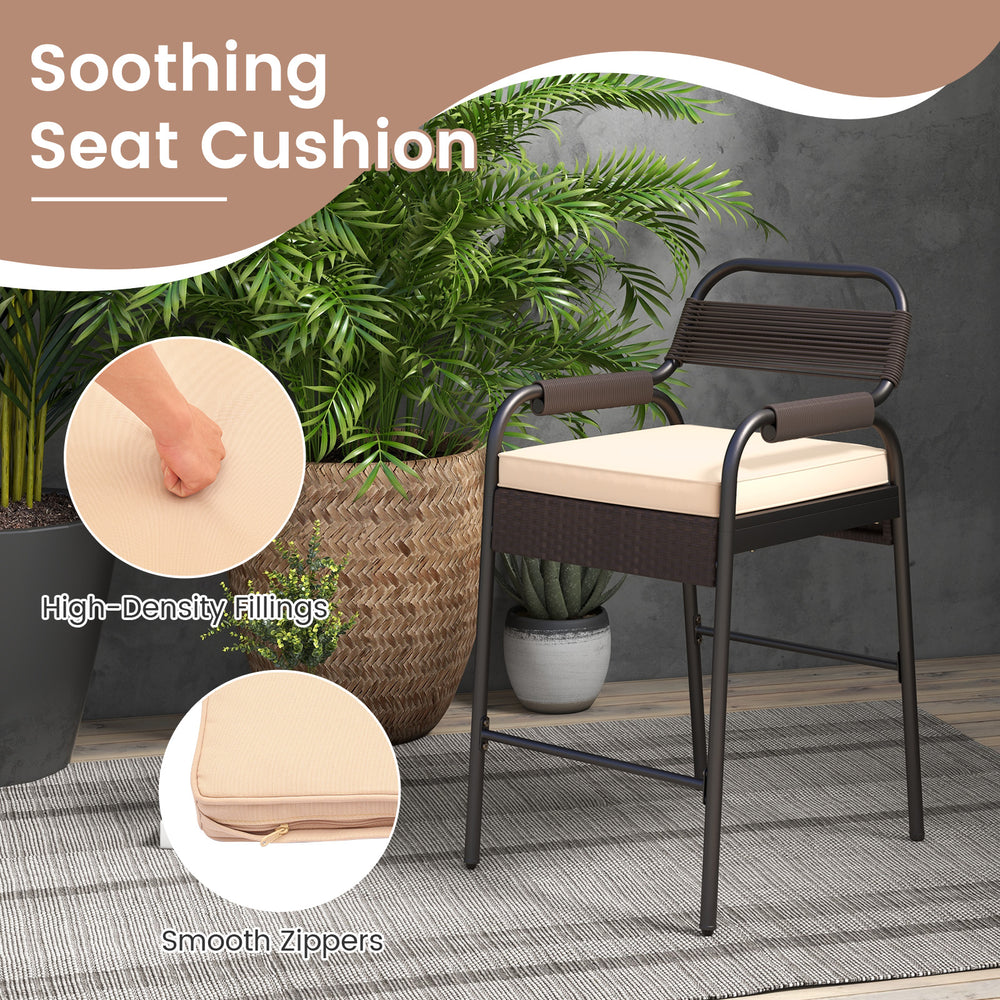 High-density seat cushion on a rattan counter stool with a stylish mesh backrest for comfort and durability.
