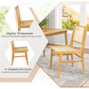 Rattan dining chair with natural cane backrest and teak wood frame, featuring a slightly tilted backrest for comfort.