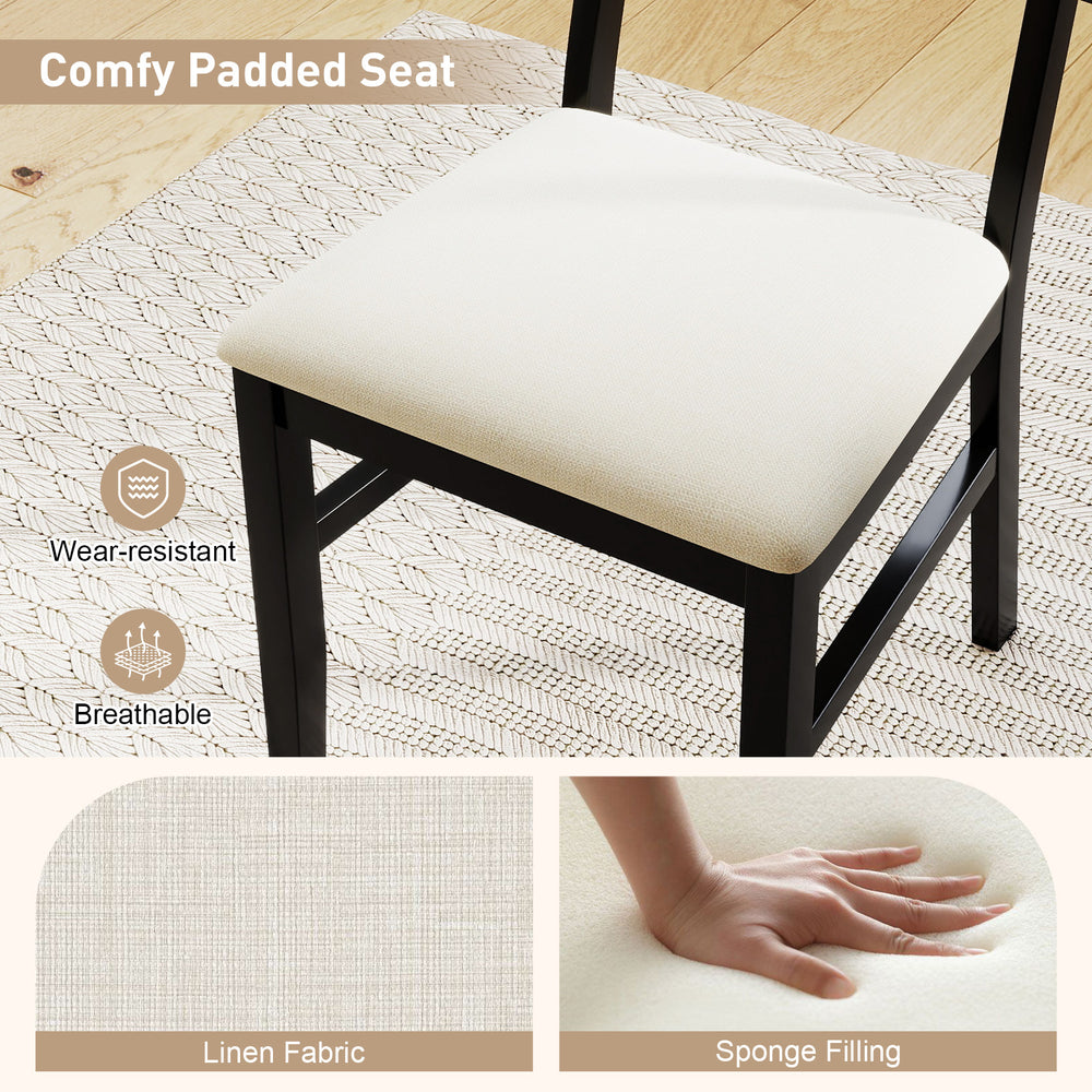 Comfy padded seat of a rattan dining chair set, featuring breathable linen fabric and sturdy rubber wood legs.