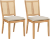 Set of 2 natural rattan dining chairs with curved backrest and padded seat, ideal for dining rooms and kitchens.
