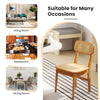 Natural rattan dining chair with ergonomic backrest, solid wood structure, suitable for living and dining rooms.
