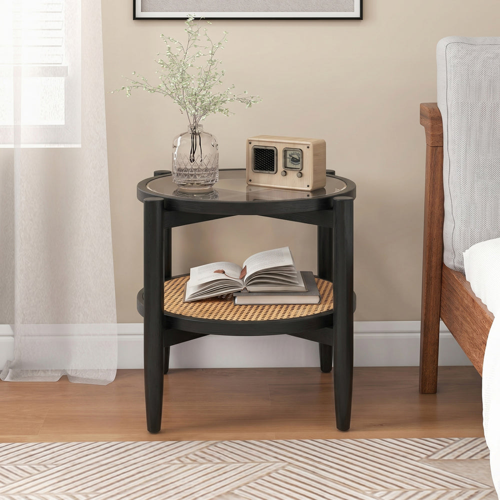 Rattan round side end table with tempered glass top and acacia wood legs, perfect for living room or bedroom use.