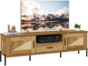 Rattan TV stand with natural finish, featuring two storage cabinets and open shelf for TVs up to 80", ideal for modern.