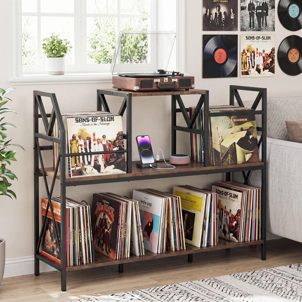 Record player stand in rustic brown with vinyl storage, power outlets, and X-shaped metal frame for music rooms.
