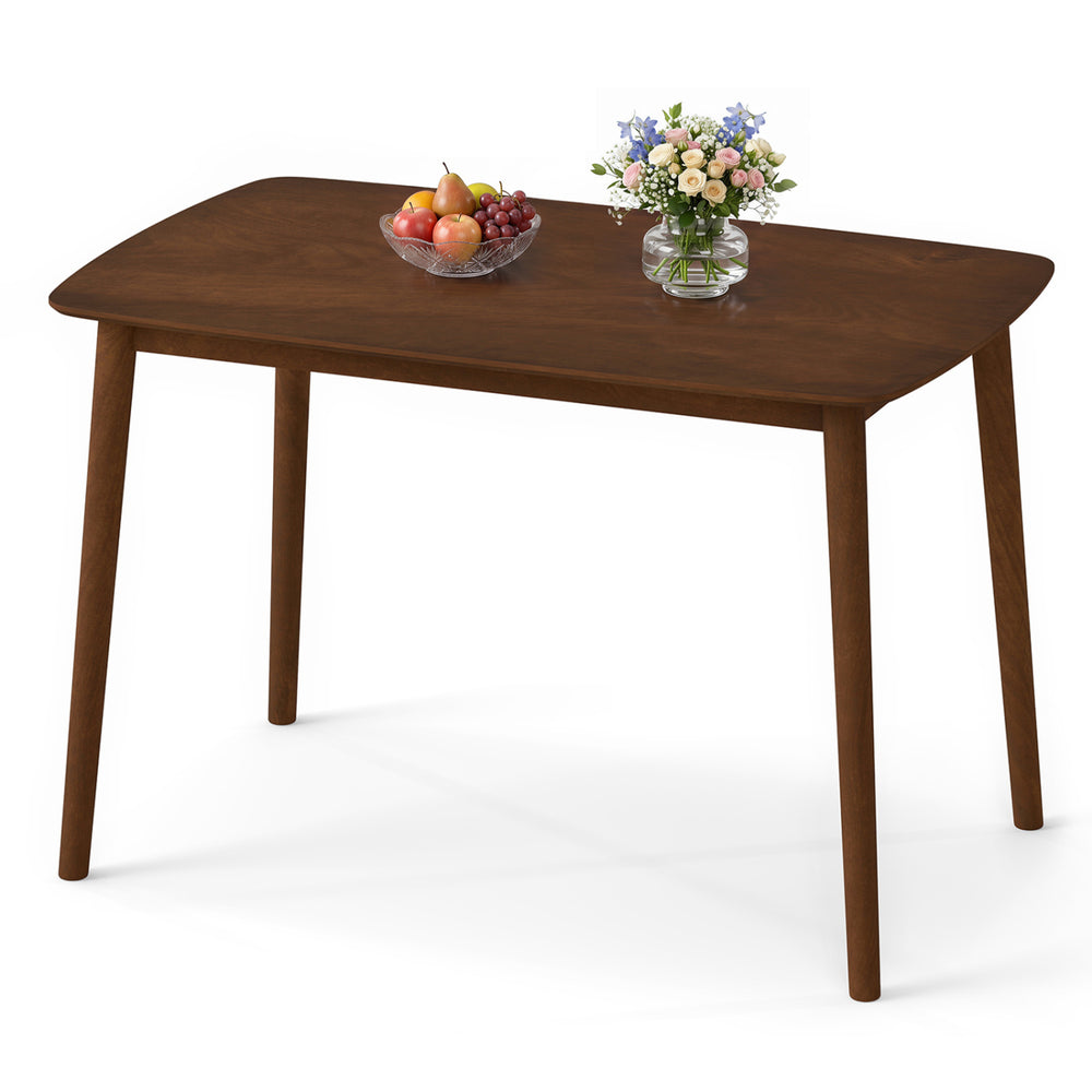 Rectangular kitchen table made of rubber wood, featuring a spacious surface and rounded corners, perfect for dining or work.