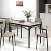 Rectangular modern dining table with grey sintered stone top and sturdy black metal frame, suitable for four people.