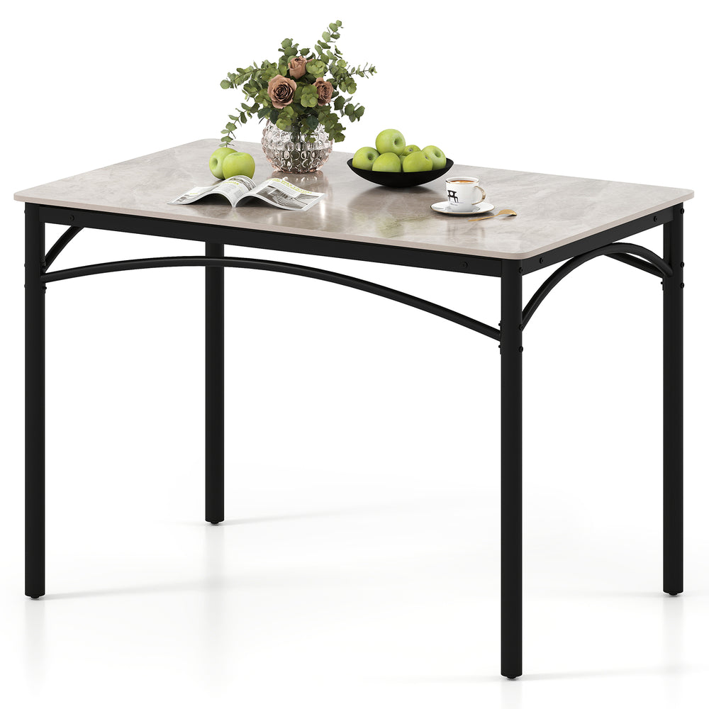 Rectangular modern dining table with grey sintered stone top and black metal frame, suitable for 4 people.