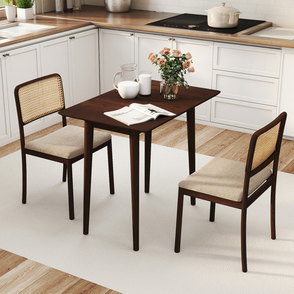 Rectangular walnut dining table for 2-4 with solid wood legs, featuring a rustic finish and compact design for kitchens.