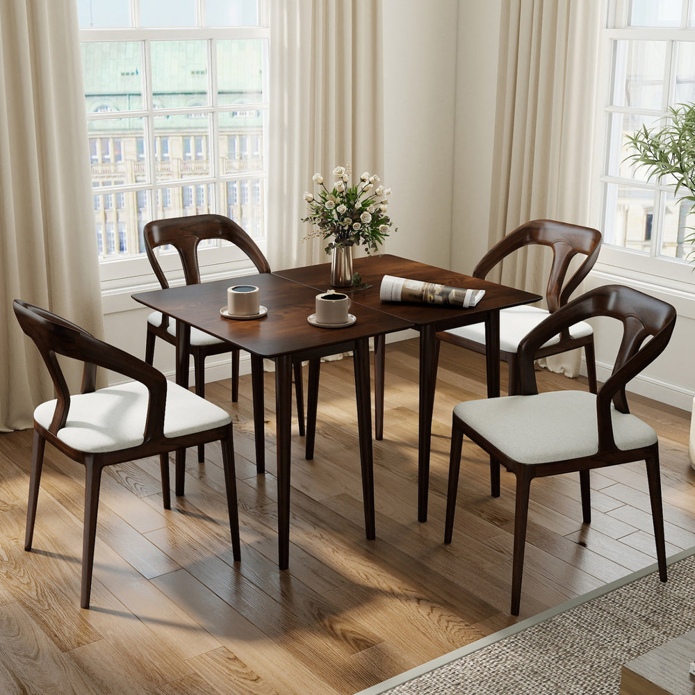 Rectangular walnut dining table with solid rubber wood legs, seating 2-4, featuring a rustic finish for modern.