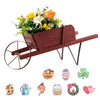 Wooden wagon planter in red with flowers, featuring 9 magnetic accessories for versatile garden decoration.