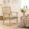 Natural rubber wood rocking chair with padded seat cushion, perfect for reading and relaxation in any room.