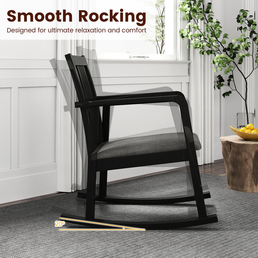Black rocking chair with slatted back and curved armrests, featuring a comfy seat and gentle rocking motion for.