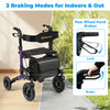 Folding rollator walker in purple with padded seat, rear wheel hand brakes, and oversized wheels for indoor and outdoor.