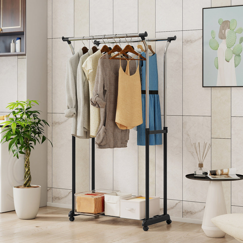 Double rod garment rack with adjustable height, featuring smooth-rolling casters for easy mobility and sturdy metal.
