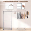 Rolling clothes rack with double rods, adjustable height, and wheels for easy mobility, ideal for laundry rooms and.