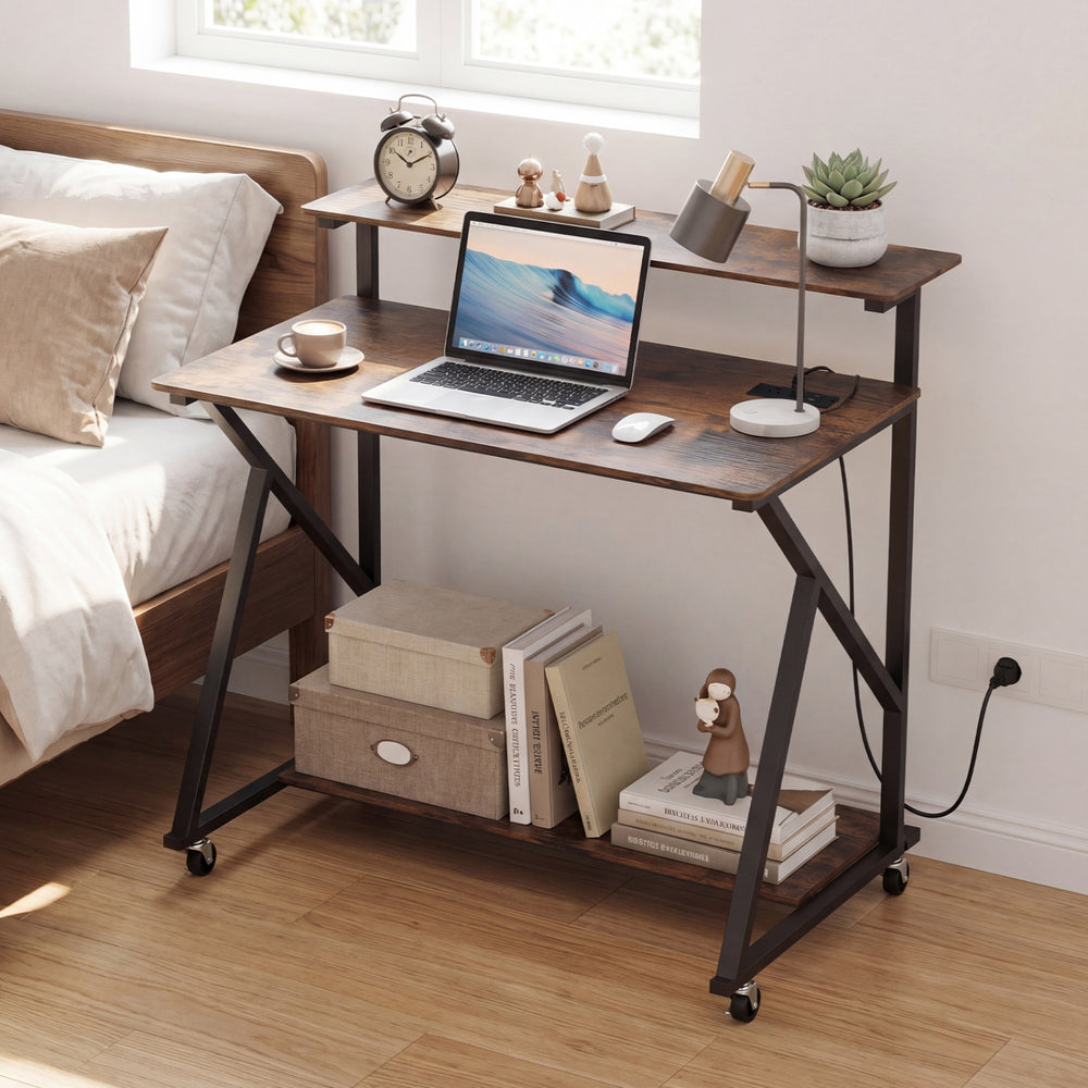Rolling computer desk in rustic brown with charging station, monitor shelf, and storage for home office use.