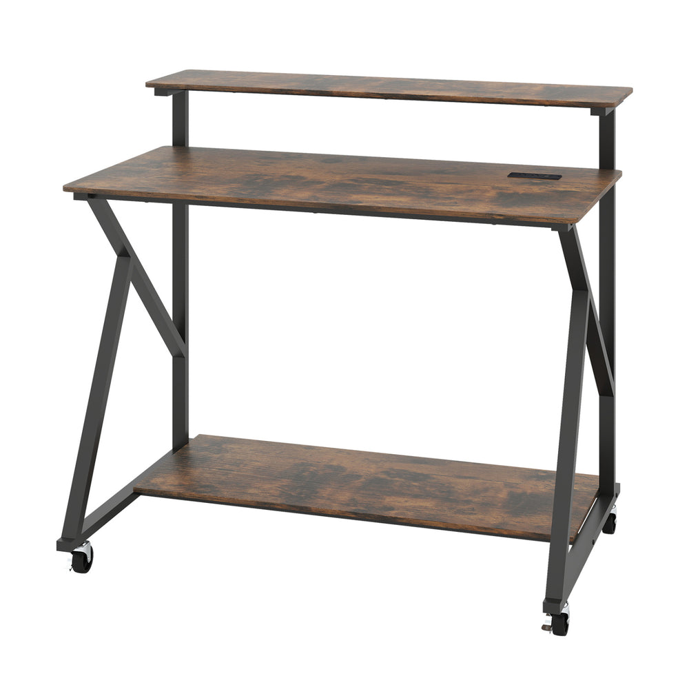 Rolling computer desk in rustic brown with charging station, monitor shelf, and mobile design for home office use.