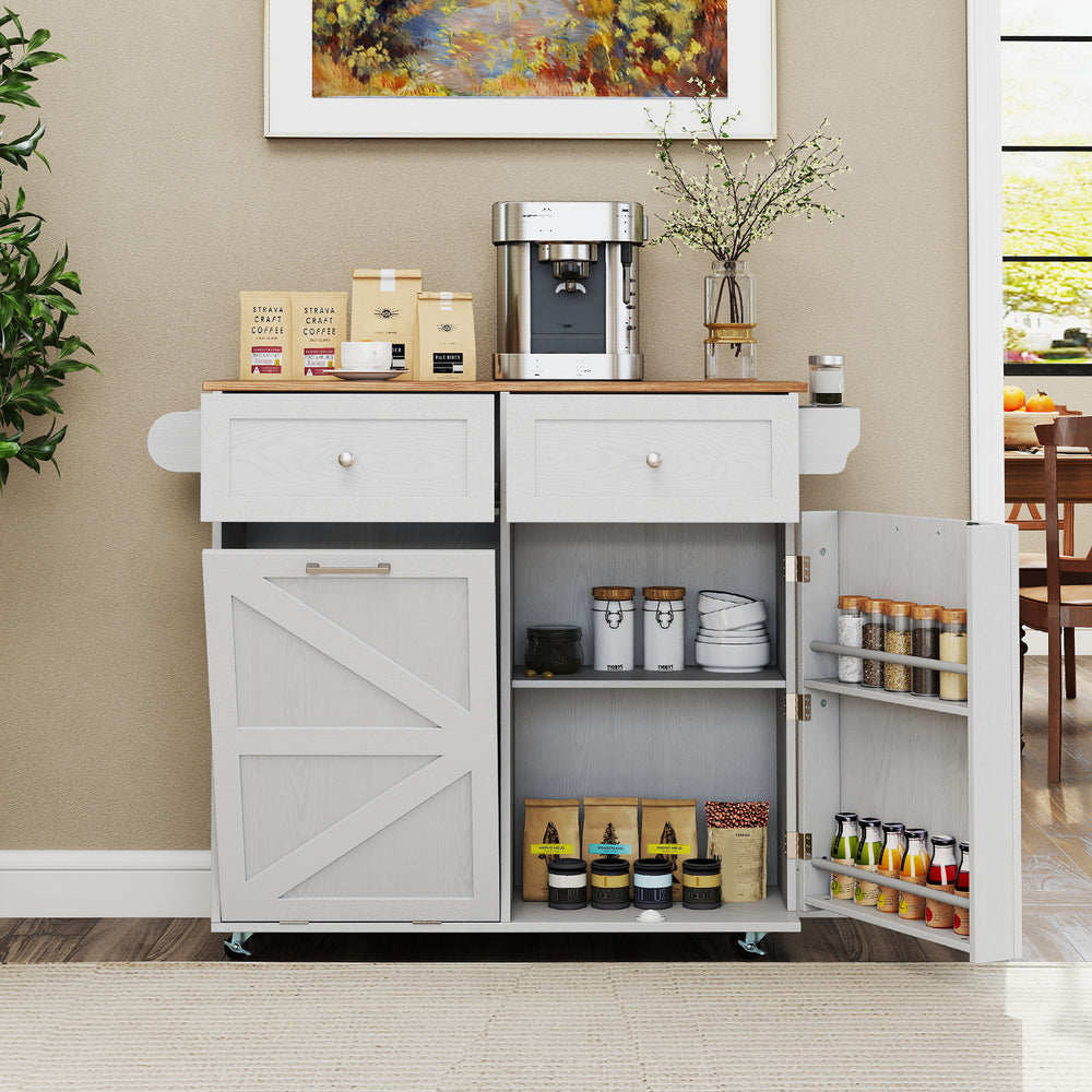 Rolling kitchen island in grey with drop leaf top, storage drawers, and trash can cabinet, perfect for kitchen.