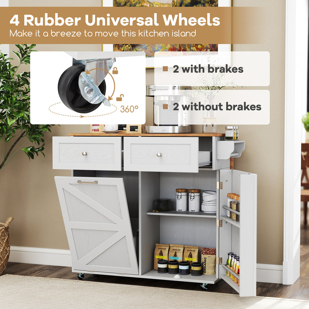 Rolling kitchen island in grey with drop leaf top, storage drawers, and 4 rubber wheels for easy mobility.