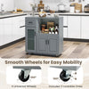 Rolling kitchen island in gray with spacious tabletop, glass door cabinet, and 4 wheels for easy mobility.