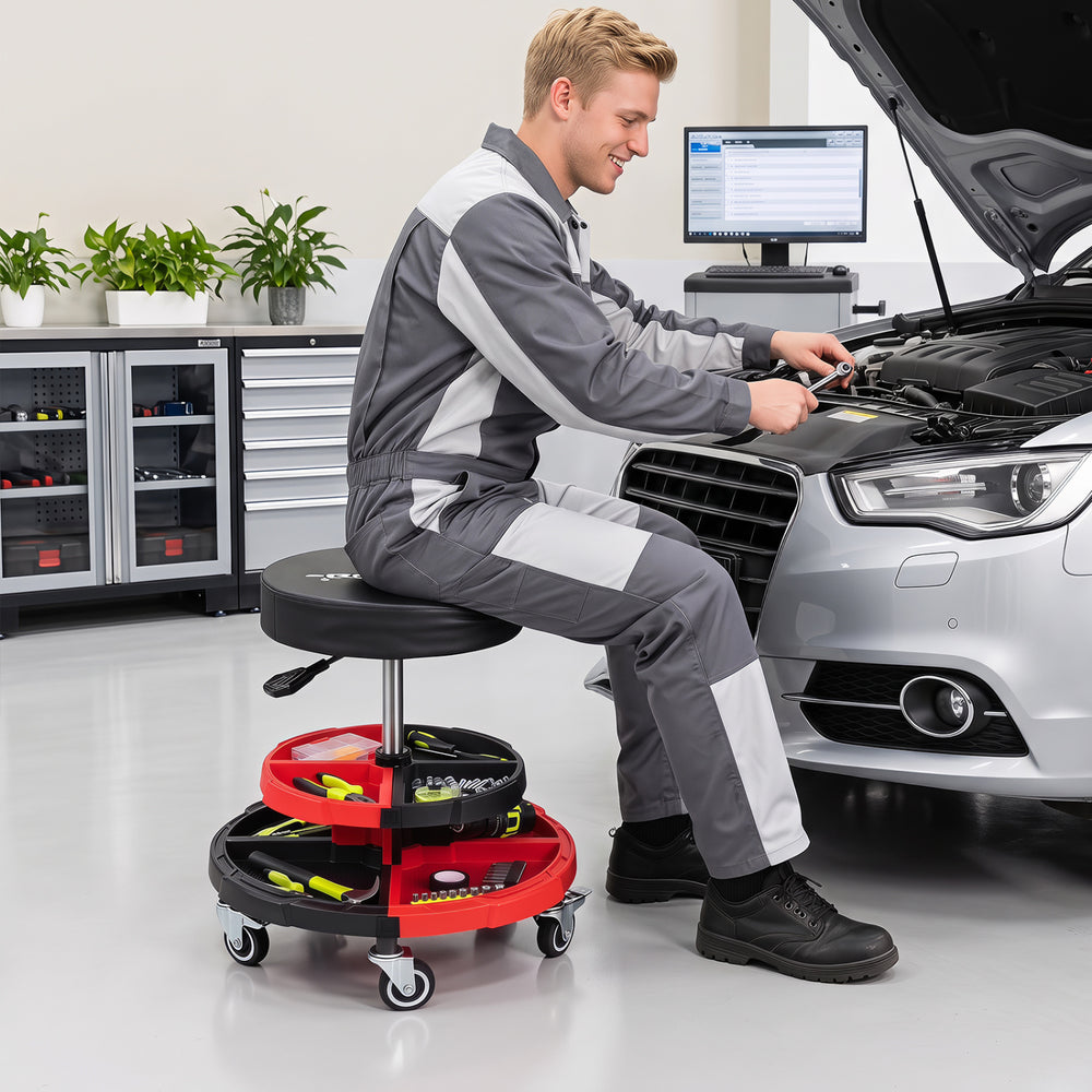 Rolling mechanic stool featuring a cushioned seat, 360° rotatable design, and five wheels for easy mobility in workshops.