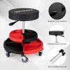 Rolling mechanic stool with cushioned seat, red storage trays, and 5 wheels for versatile use in repair shops and garages.