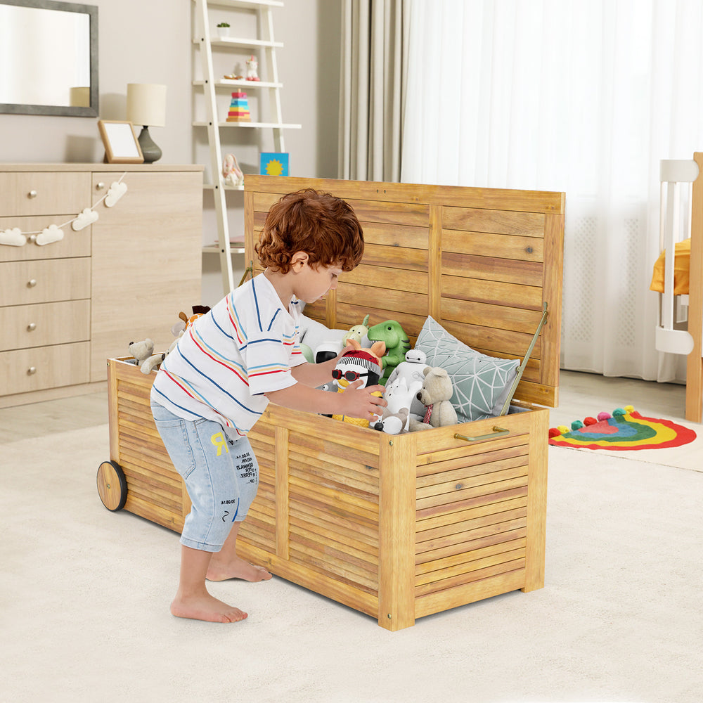 Rolling patio wooden deck box with slatted design, 48-gal capacity, and wheels for easy outdoor storage.