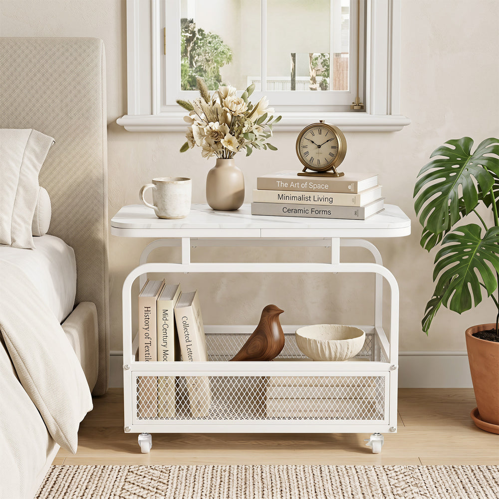 Narrow rolling side table showcases a stylish faux marble top and a metal mesh basket, ideal for bedside organization.
