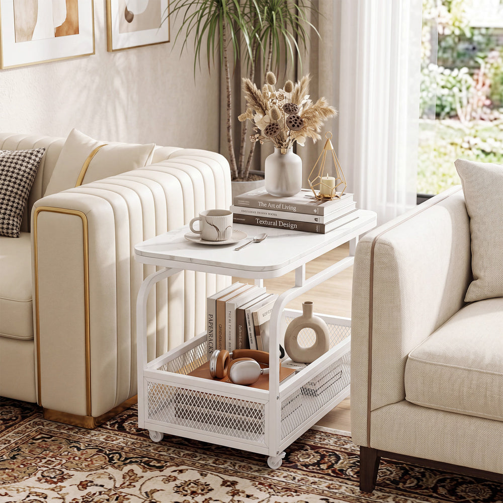 Narrow rolling side table with a faux marble top and raised baffle, designed for secure storage in tight spaces.