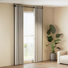 Adjustable black room divider curtain rod with floor-to-ceiling tension, suitable for various room layouts and no.