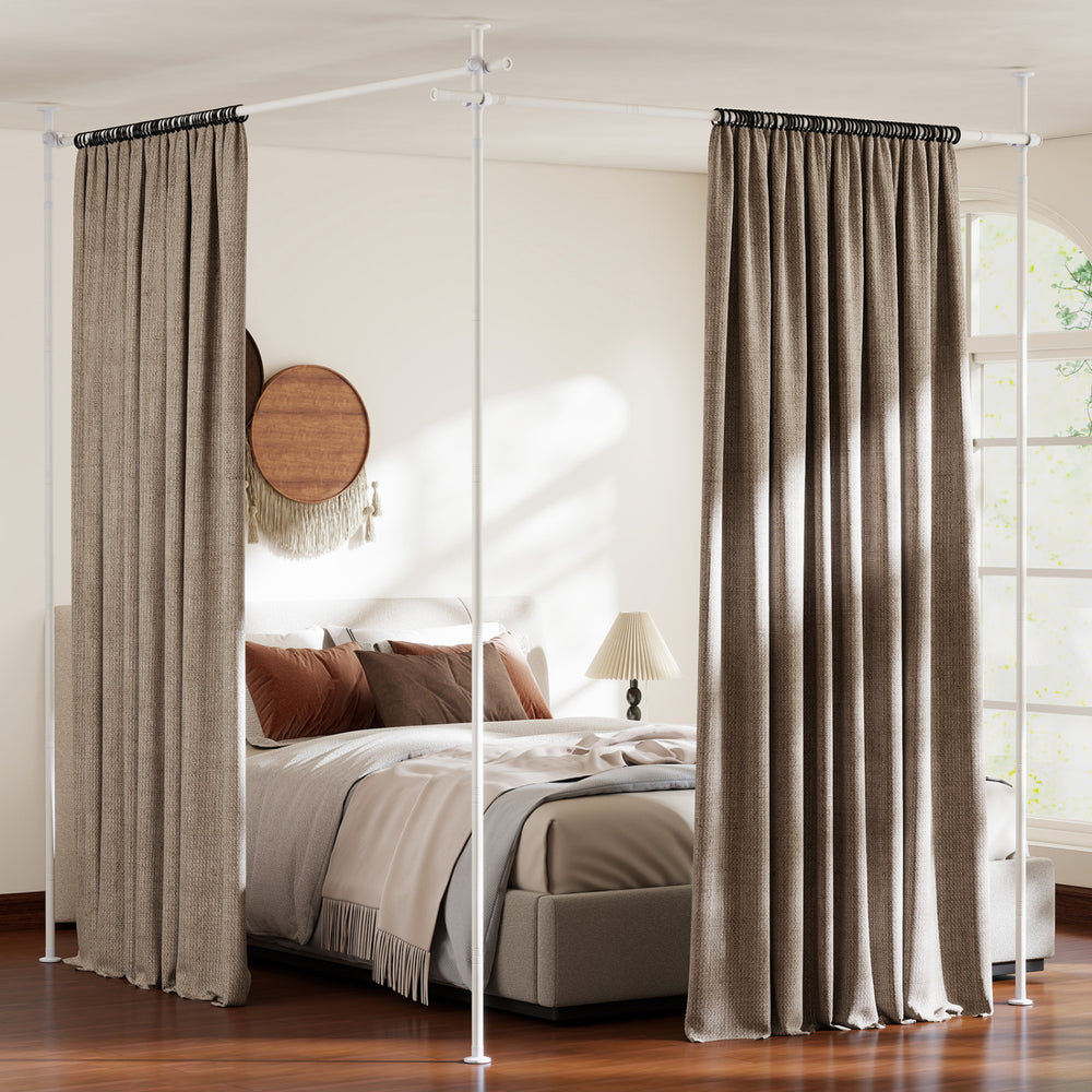 Adjustable floor-to-ceiling tension rod in white, designed for easy installation and support of various curtain types.