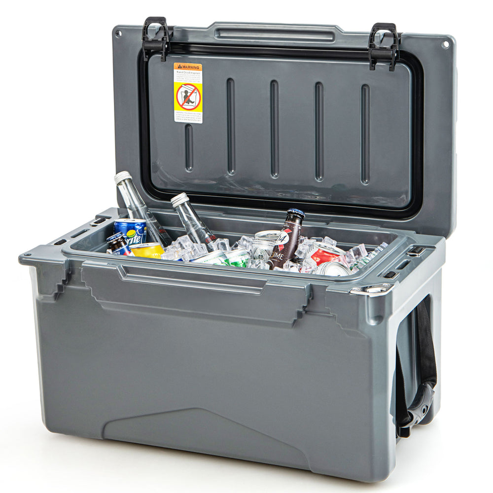 Gray rotomolded cooler with integrated cup holders, filled with ice and drinks, ideal for camping and outdoor use.