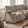 C-shaped side table in solid teak wood with thickened top, perfect for holding essentials beside your couch.