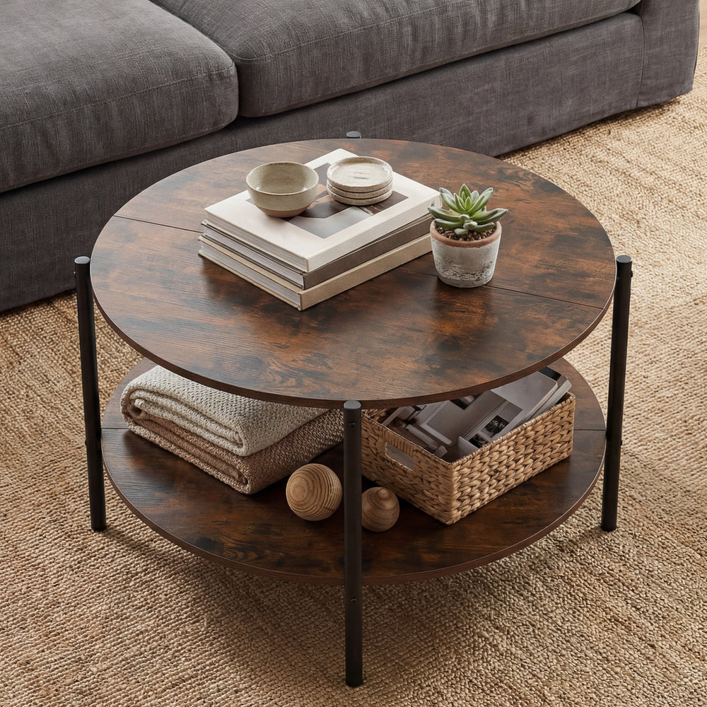 Round coffee table in rustic brown with a sturdy metal base, showcasing a spacious top and lower shelf for storage.
