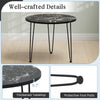 Round coffee table featuring a thickened black faux marble tabletop and metal tripod legs, ideal for modern living.