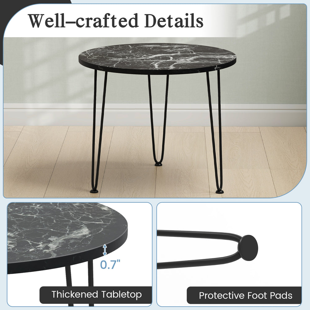 Round coffee table featuring a thickened black faux marble tabletop and metal tripod legs, ideal for modern living.