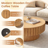 Modern wooden drum coffee table with fluted accents, hidden storage, and sturdy pedestal for living room organization.