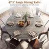 Round 47.5" gray dining table for 4-6 with metal legs and storage shelf, perfect for family gatherings.