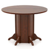 Round dining table with walnut finish, sturdy pedestal base, and spacious top for 4-6 people, ideal for various.