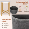 Round end table with a white top and detachable felt basket, perfect for storing snacks, magazines, and blankets.