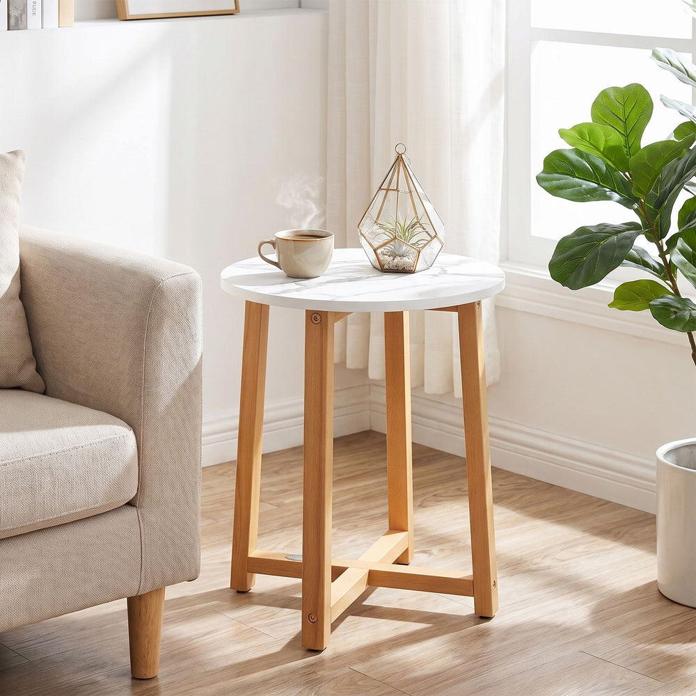 Round end table with a 16" faux marble top and acacia wood legs, perfect for living room decorations and compact use.