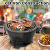 Round hibachi grill with 12-inch double-sided grate, made of cast iron for even heating and portable outdoor cooking.