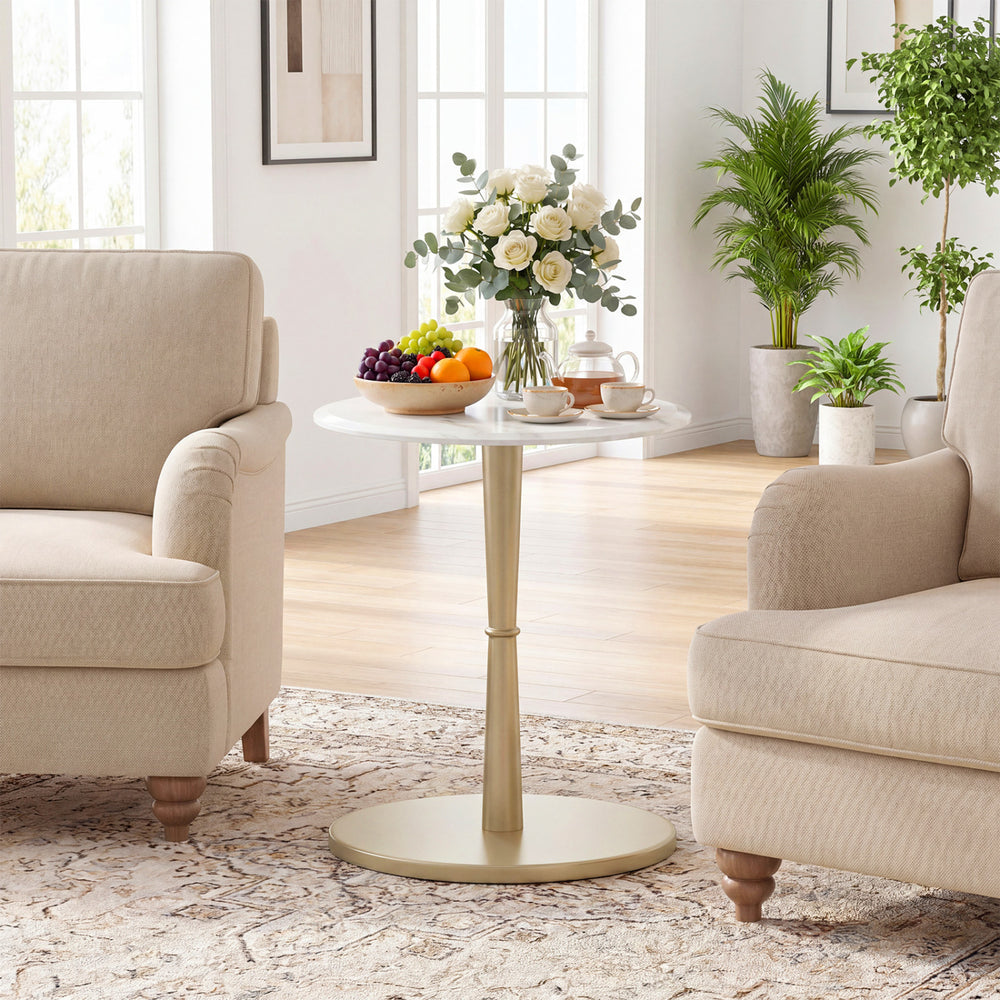 Round marble side table with stone finish and wooden base in white and gold, perfect for small spaces in living rooms.
