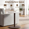 Round marble side table with a stone finish, featuring a wooden base, ideal for books and decorations in any living.