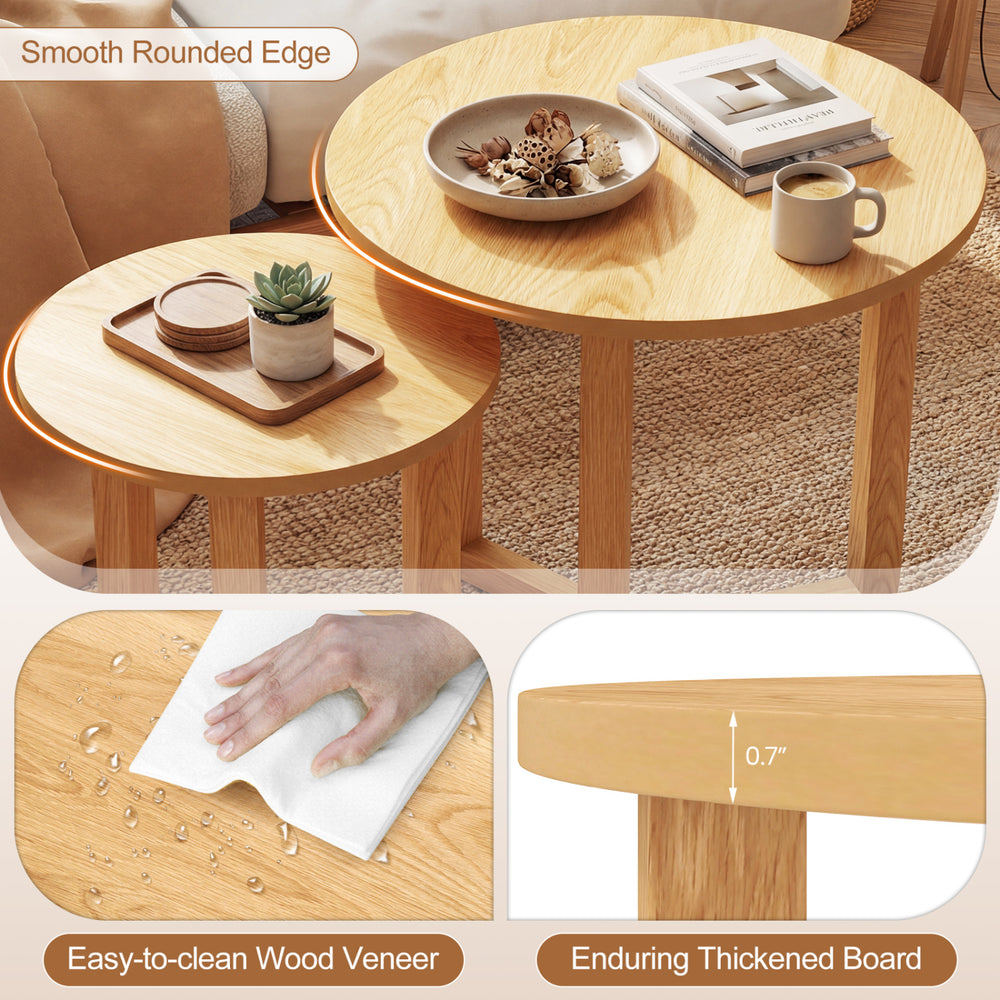 Round nesting coffee table set of 2 with natural wood veneer, featuring smooth edges and thickened tops for durability.