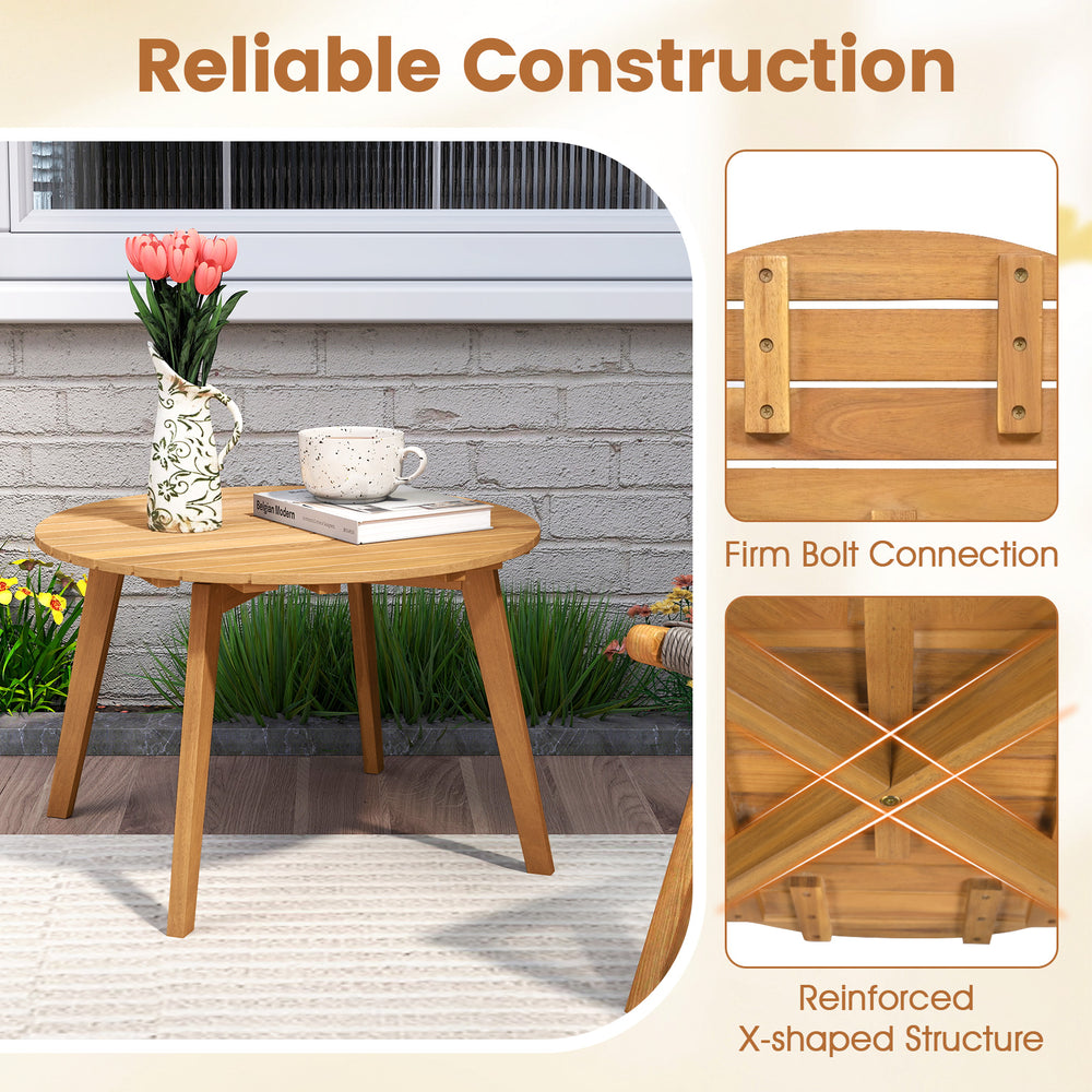 Round outdoor acacia wood side table with slatted tabletop and reinforced X-shaped structure for patio or garden use.
