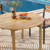 Round outdoor dining table made of acacia wood, seating 4, perfect for poolside gatherings and easy to clean.