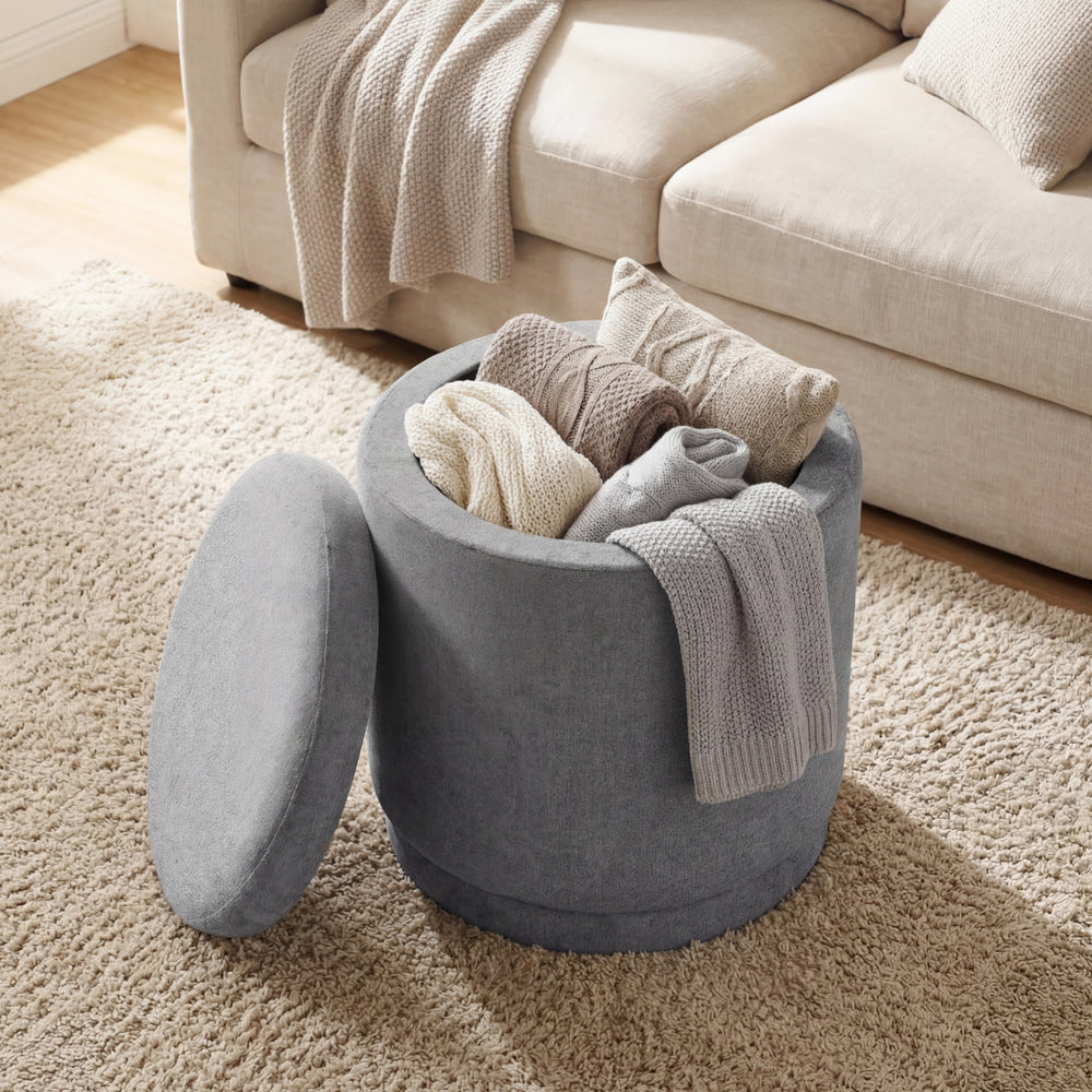 Round gray storage ottoman with removable lid, acacia wood frame, and soft chenille fabric for versatile home use.