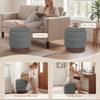 Round storage ottoman in gray with acacia wood frame, versatile as a footstool or side table for living room use.